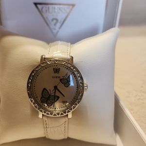 Guess brand watch. White with diamond accents